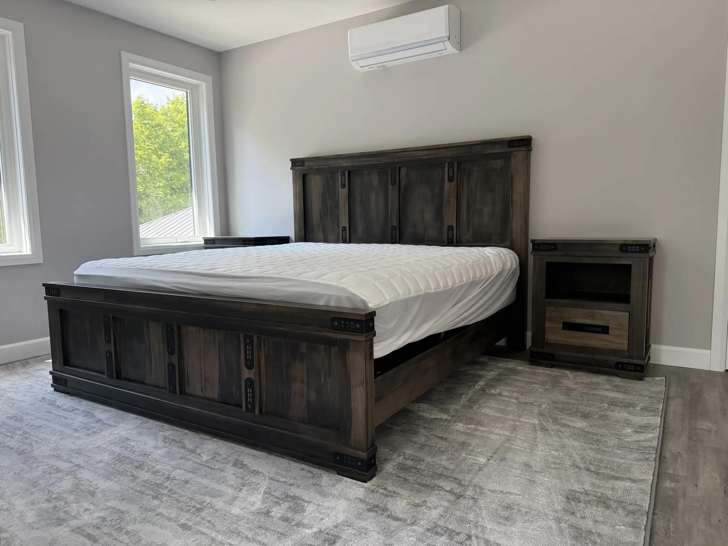 Custom industrial-style solid wood bed and matching nightstands