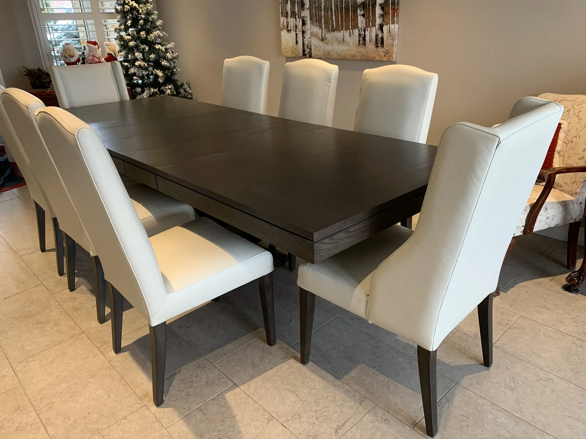 Contempo dark wood dining table with white upholstered chairs