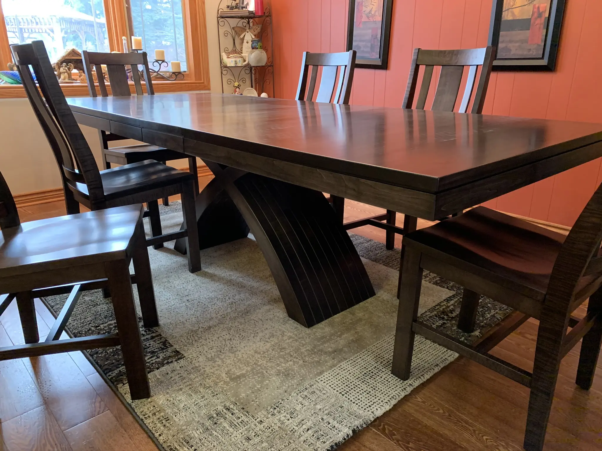 Fifth Avenue solid wood dining table in a colourful dining room