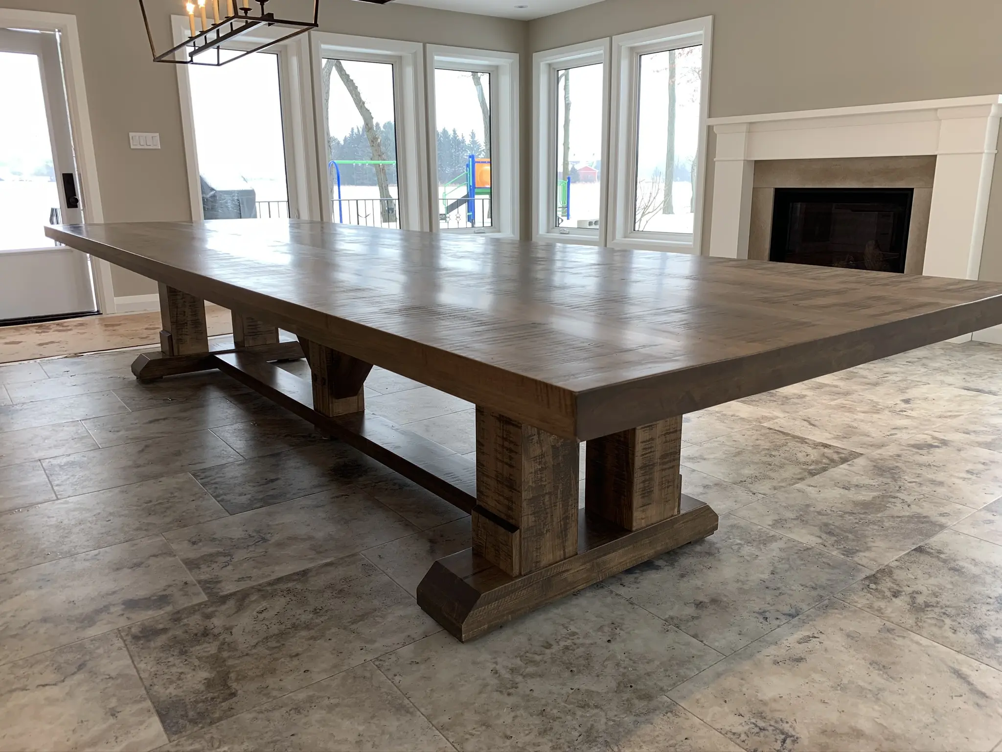 Large Grimshaw solid wood dining table installed in a bright open room