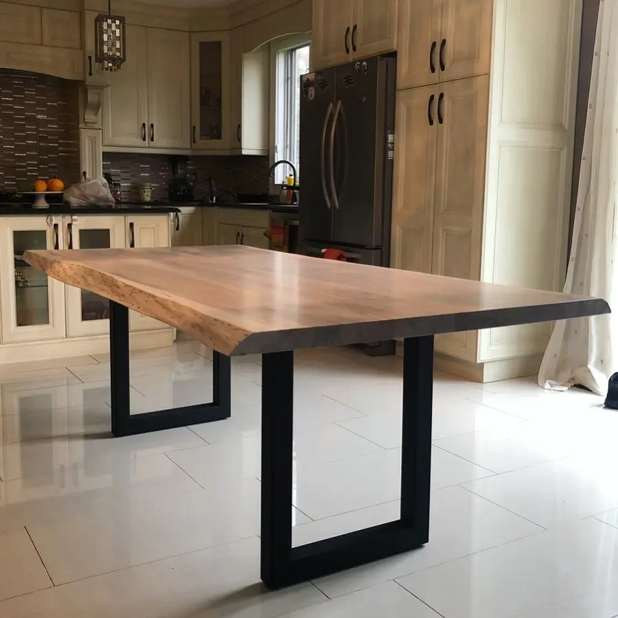 Live edge solid wood dining table with modern black metal legs