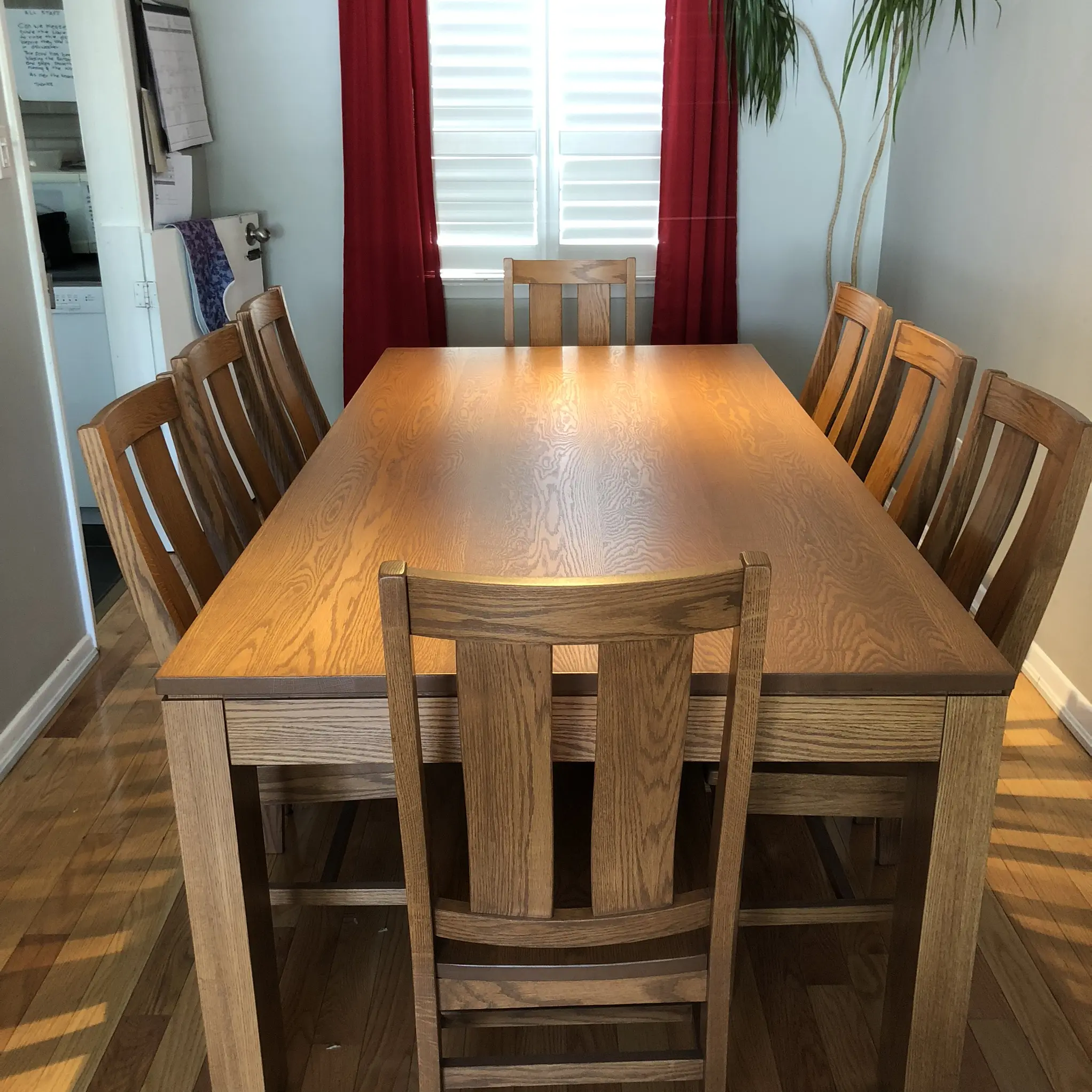 Mannheim solid wood dining table and chairs staged in a family dining room