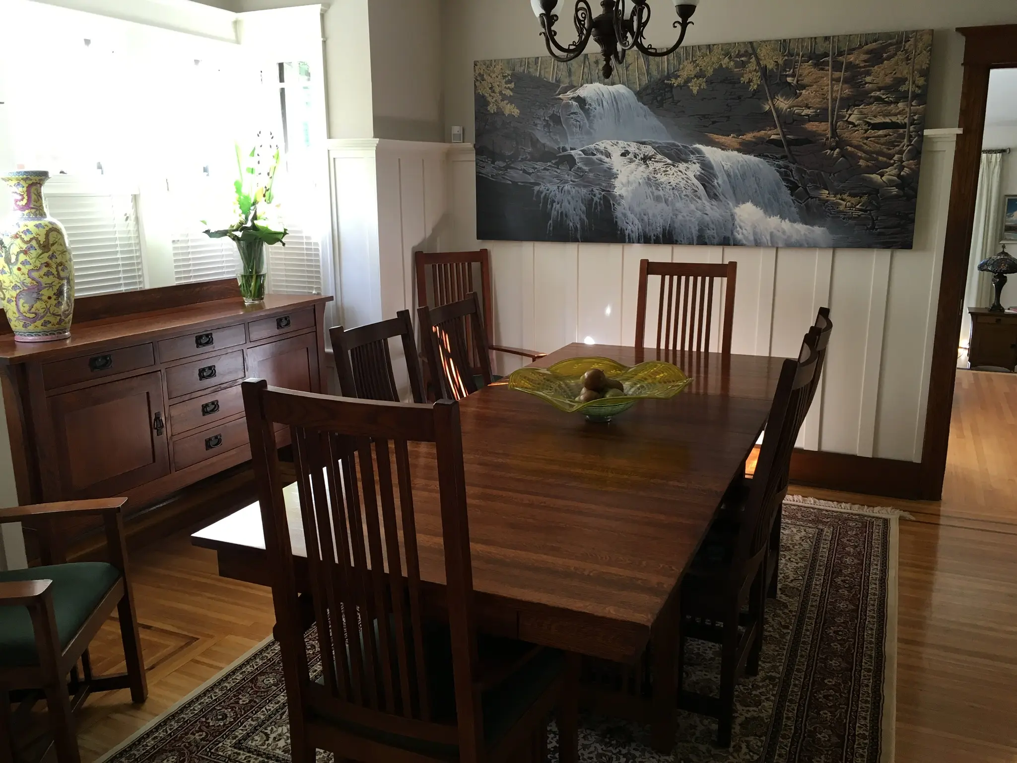 Morris Plains solid wood dining table and chairs in a finished home